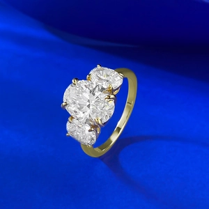 Three-stone S925 silver oval cut engagement ring with gold plating and four-claw setting