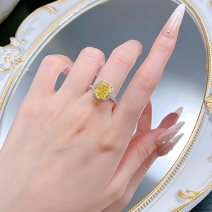 S925 silver halo ring featuring a large yellow cushion cut ice flower high carbon diamond