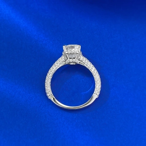 Macro shot of 925 silver radiant cut ring with ice flower diamond and pave setting
