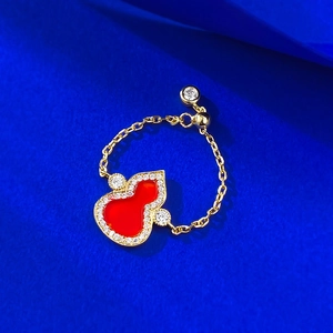 925 silver gold-plated wulu ring with red agate and zircon on blue silk