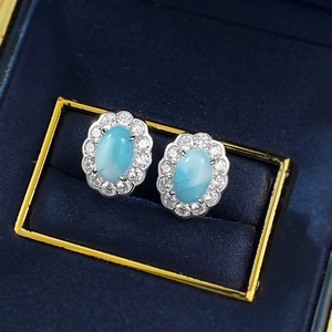Oval Larimar stud earrings with halo cubic zirconia setting in S925 silver on velvet