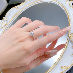 Macro detail of S925 sterling silver ring featuring a radiant cut ice flower diamond