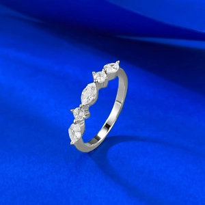 Elegant S925 silver ring featuring marquise and round cut gems on blue satin