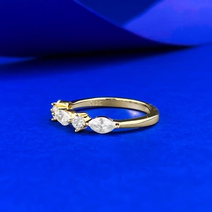 Detailed view of S925 hallmark and marquise-cut stones on a gold-plated silver ring