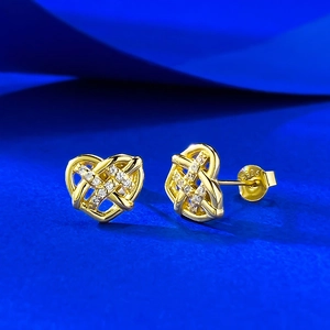 Macro view of S925 sterling silver heart stud earrings with cubic zirconia and S925 hallmark