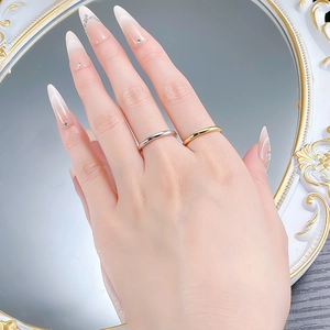 Polished 925 sterling silver and 18K gold plated minimalist band rings on model
