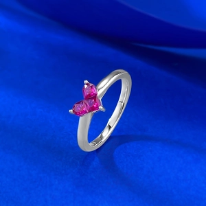925 sterling silver ring featuring dual pink heart gemstones on a polished band