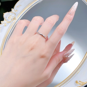 Minimalist 925 silver plain ring shown on finger against a vintage mirror backdrop