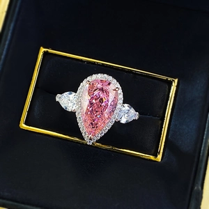 Luxury 925 silver ring featuring a pear-cut pink carbon diamond in a halo setting