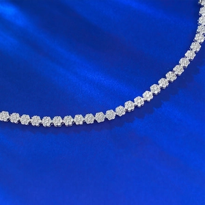 Macro shot of silver S925 snowflake tennis chain with cluster pavé cubic zirconia