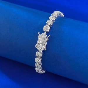 S925 silver snowflake bracelet with sparkling zircon stones on a blue display stand