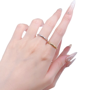 Set of minimalist 925 sterling silver bands in polished gold and silver finishes