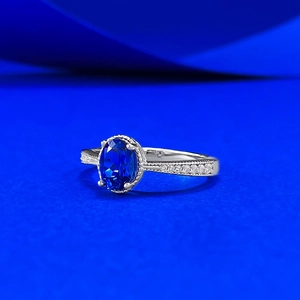 S925 sterling silver ring with oval blue sapphire and micro-pave side diamonds