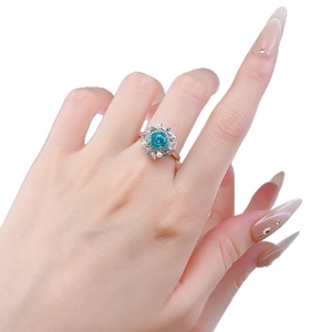 925 silver ring featuring Paraiba blue gem with white pearls and floral zircon accents