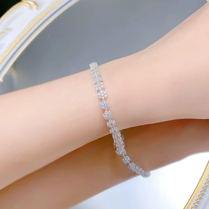 Detailed view of S925 sterling silver snowflake bracelet with cluster set sparkling stones