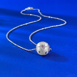 S925 sterling silver brushed ball necklace with pink star-shaped zircon on blue background