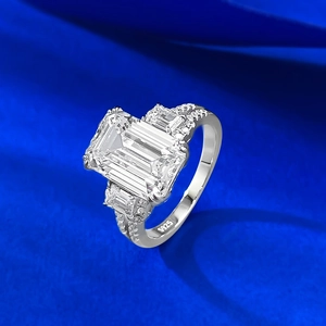 Classic S925 sterling silver ring with emerald cut white stone and side accent diamonds