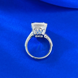 Elegant 925 sterling silver ring with Asscher cut white diamond on blue silk