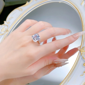 Detailed view of 925 silver ring featuring a large Asscher cut cubic zirconia on a mirror