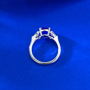 Elegant S925 silver ring featuring a large blue spinel centerpiece with side stones