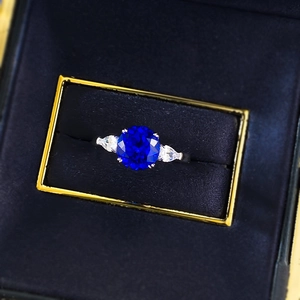 Classic S925 silver ring featuring 8mm blue spinel and pear-cut side diamonds