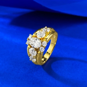 Macro shot of S925 silver gold ring featuring an oval-cut gemstone on blue velvet