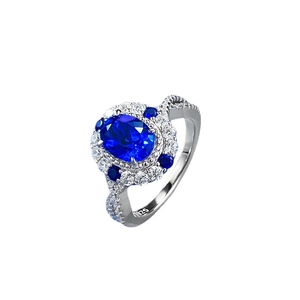 Vintage S925 silver ring featuring oval blue sapphire stone and twisted band design