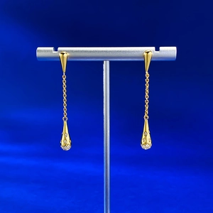 Elegant gold-tone S925 silver teardrop tassel earrings with micro-inlaid zircon accents