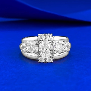 Luxurious S925 silver ring featuring an oval halo crystal and cluster diamond accents