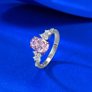 S925 silver ring featuring an oval pink gemstone and brilliant side accent diamonds