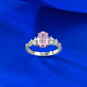 Detailed macro view of S925 silver ring featuring pink oval stone with side diamonds