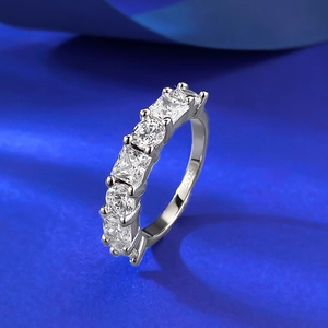 Minimalist S925 sterling silver ring with geometric pavé diamonds on dark blue silk