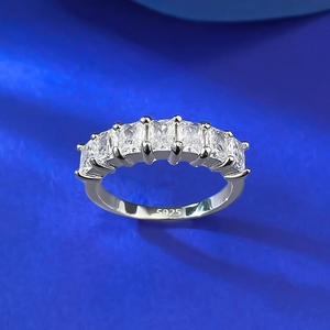 Minimalist S925 silver ring featuring a row of seven rectangular step-cut cubic zirconia