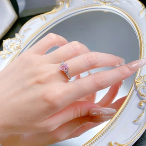 S925 silver ring with 6x9mm pink ice-cut stone and side accent diamonds on hand