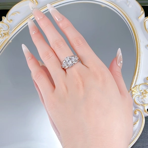 Close-up of luxury S925 silver ring with 5x7 oval gem and pavé diamond detailing