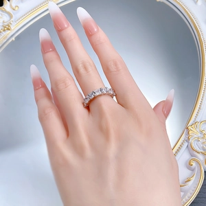 Close-up of geometric eternity band with square-cut diamonds on hand