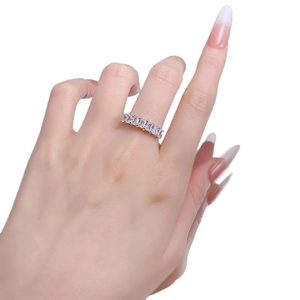 Minimalist S925 sterling silver ring featuring a row of baguette cut crystals on model
