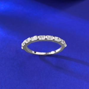 Macro view of S925 sterling silver ring featuring nine baguette-cut sparkling diamonds