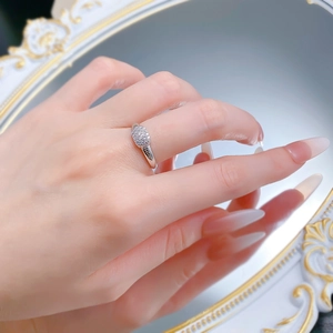 Elegant S925 silver rectangular pave-set diamond ring shown in a vintage mirror reflection