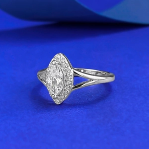 Elegant S925 sterling silver marquise cut ring with halo setting on a blue background
