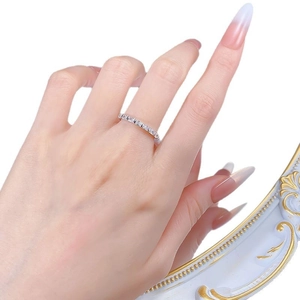 Elegant S925 sterling silver eternity ring with rectangular diamonds on a female hand