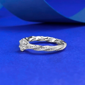 Elegant S925 silver 6-prong ring with a 5mm cubic zirconia and twisted pave band