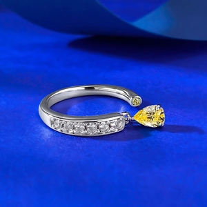 Elegant S925 silver open ring featuring a pear-cut yellow diamond and pave-set zircons