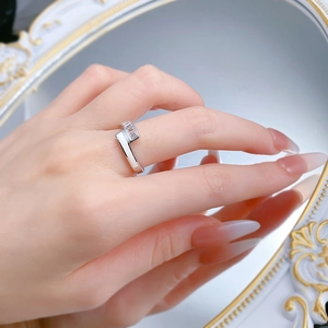 Elegant S925 silver ring with square zircon and white enamel on a vintage mirror