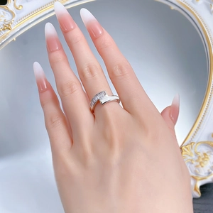 Macro detail of S925 silver ring featuring square zircon and white shell inlay on model