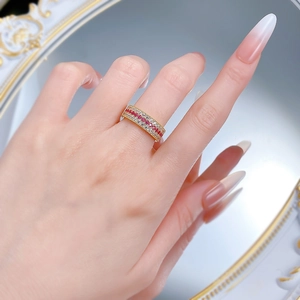 Detail of S925 silver ring with Italian style brushed gold and three rows of micro-pave stones
