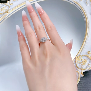 Detailed close-up of a square halo S925 silver ring with sparkling round zircon stones