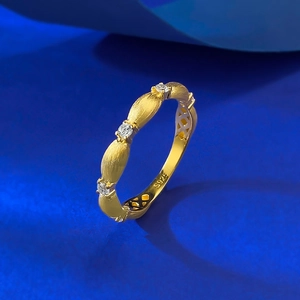 Elegant gold plated S925 silver ribbon ring with bamboo texture and sparkling zircons