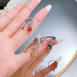 Three-piece silver S925 ring set featuring pear-cut yellow and green crystal drop charms