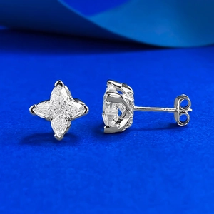 S925 silver stud earrings featuring 7x7mm star-shaped cubic zirconia on blue background